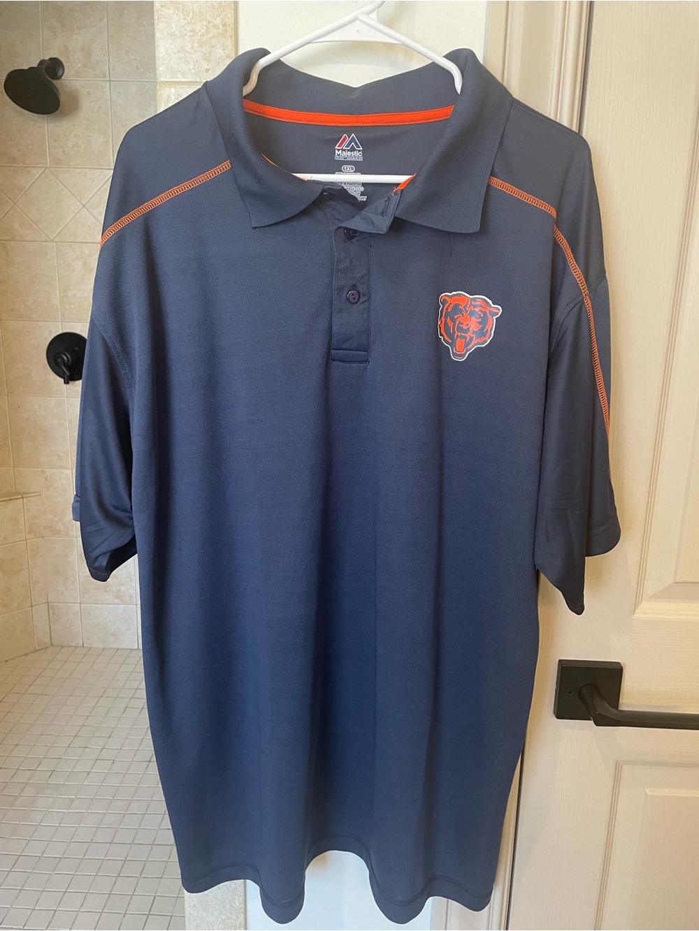 Majestic Navy Polo with Orange Trim and Team Patch